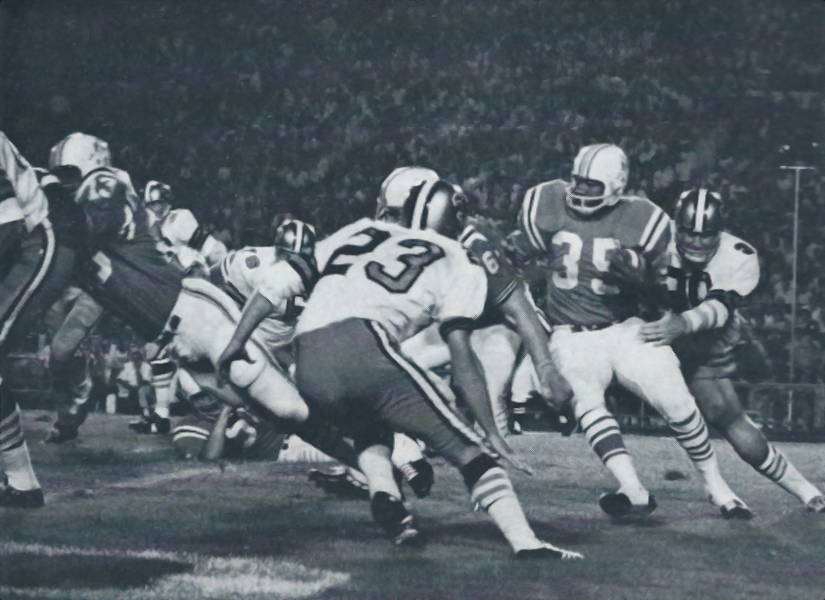 Les Kelly and Dave Whitsell Move in to Tackle Jim Nance of the Patriots in 1968 Preseason Action